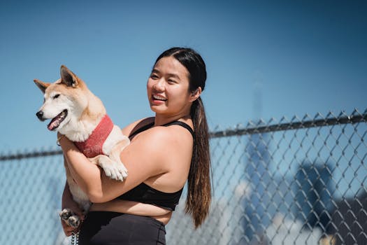 happy puppy owner with their well-trained dog